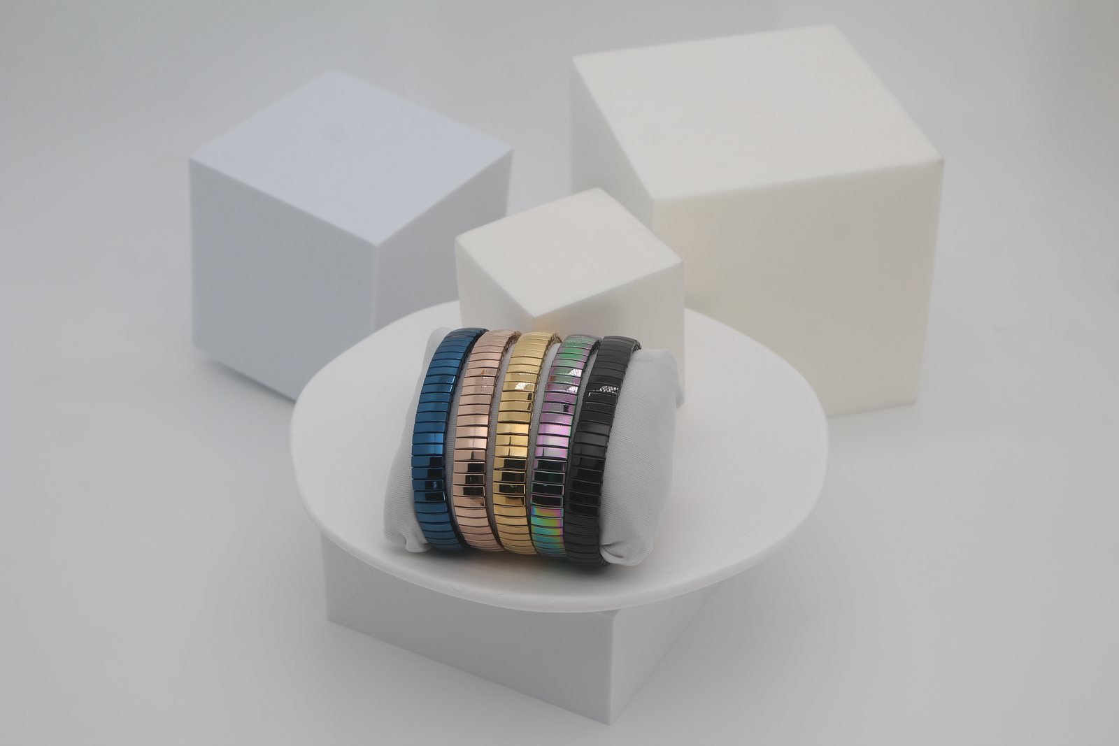 Common stainless steel jewelry plating colors in blue, rose gold, gold, rainbow and black