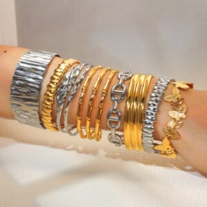 Gold and steel-tone hydraulic-pressed stainless steel bangles in varied textured designs